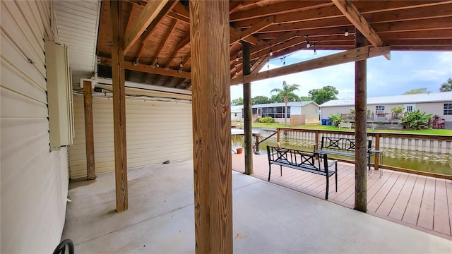1066 5th St, Okeechobee, FL 34974 - view of patio / terrace with a residential view and a water view