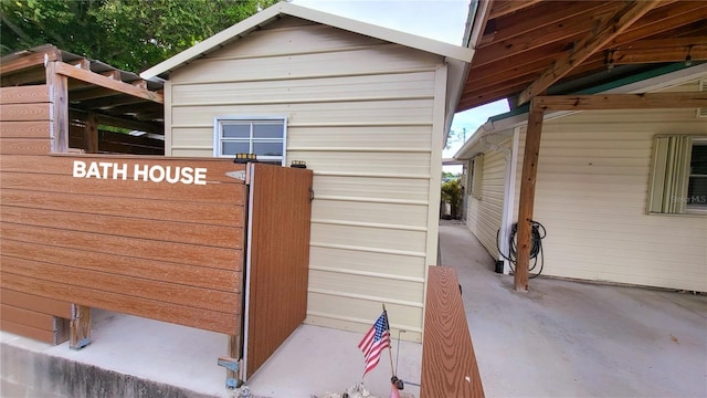 1066 5th St, Okeechobee, FL 34974 - view of home's exterior with a patio area