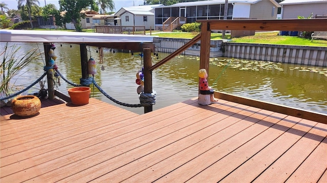 1066 5th St, Okeechobee, FL 34974 - dock with a water view and a residential view