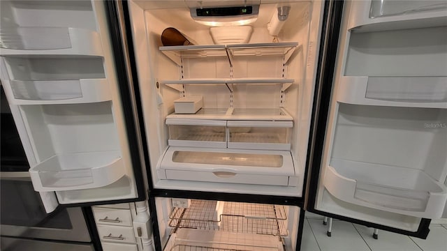 1066 5th St, Okeechobee, FL 34974 - kitchen view of fridge and open shelves