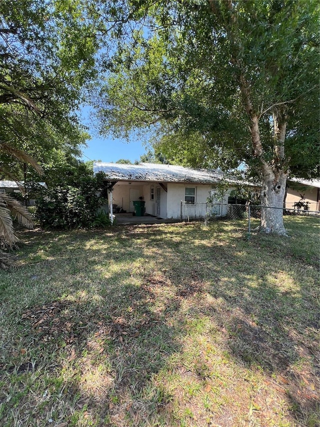 508 NW 17th St, Okeechobee, FL 34972 - view of yard featuring an attached carport