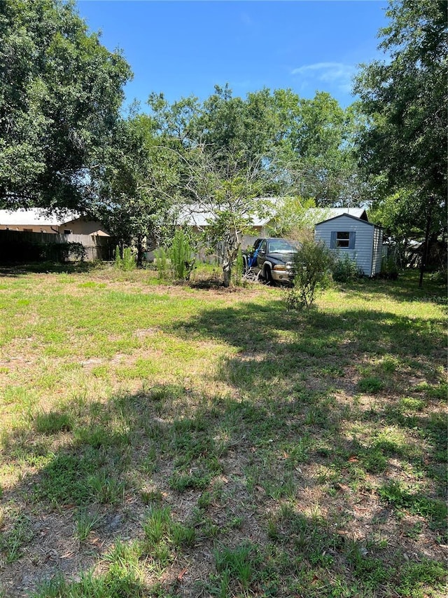 508 NW 17th St, Okeechobee, FL 34972 - view of green lawn with an outdoor structure