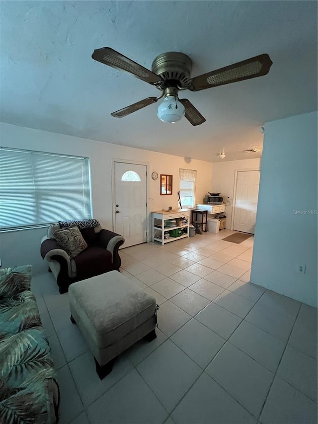 508 NW 17th St, Okeechobee, FL 34972 - living room featuring tile patterned flooring and ceiling fan