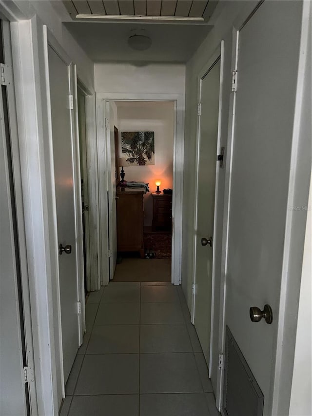 508 NW 17th St, Okeechobee, FL 34972 - hallway featuring light tile patterned floors