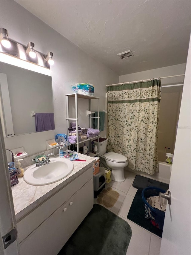 508 NW 17th St, Okeechobee, FL 34972 - full bath with tile patterned flooring, toilet, vanity, and shower / tub combo