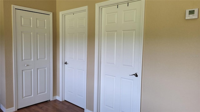 16159 NW 258th St, Okeechobee, FL 34972 - unfurnished bedroom featuring baseboards and dark wood-style flooring