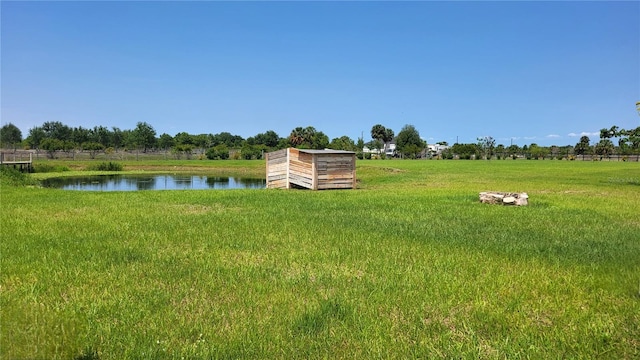 16159 NW 258th St, Okeechobee, FL 34972 - view of grassy yard with a water view