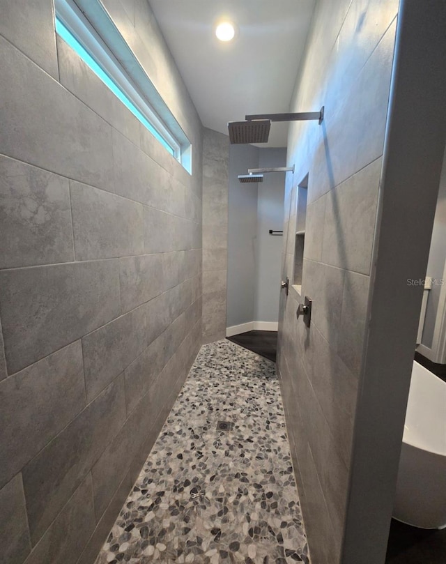 4486 SW Cacao St, Port St Lucie, FL 34953 - full bathroom featuring a tile shower