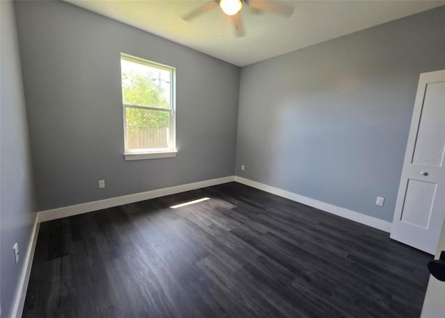 4486 SW Cacao St, Port St Lucie, FL 34953 - unfurnished room with ceiling fan, dark wood-style floors, and baseboards