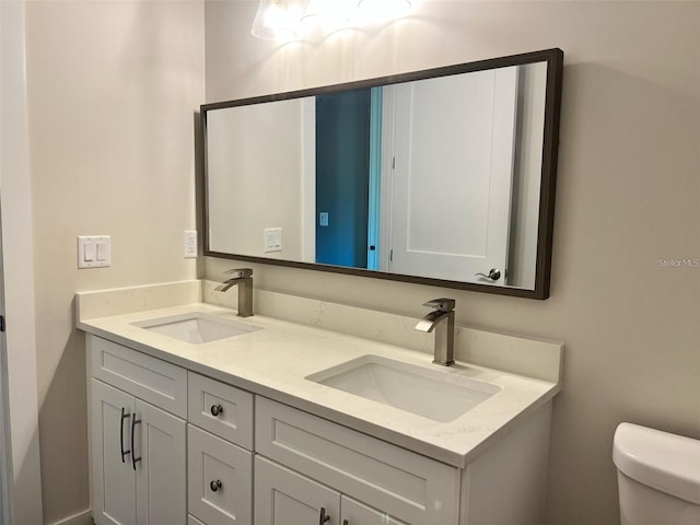 4486 SW Cacao St, Port St Lucie, FL 34953 - bathroom with toilet and double vanity