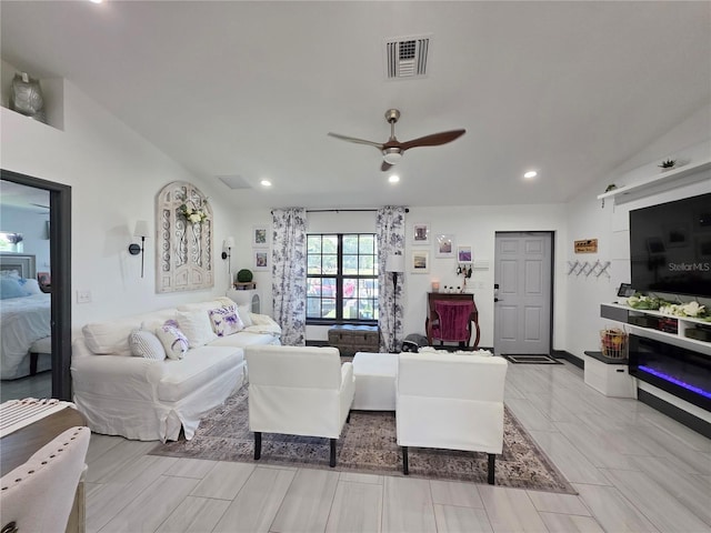 7935 NW 90th Ct, Okeechobee, FL 34972 - living area with vaulted ceiling, a ceiling fan, and recessed lighting