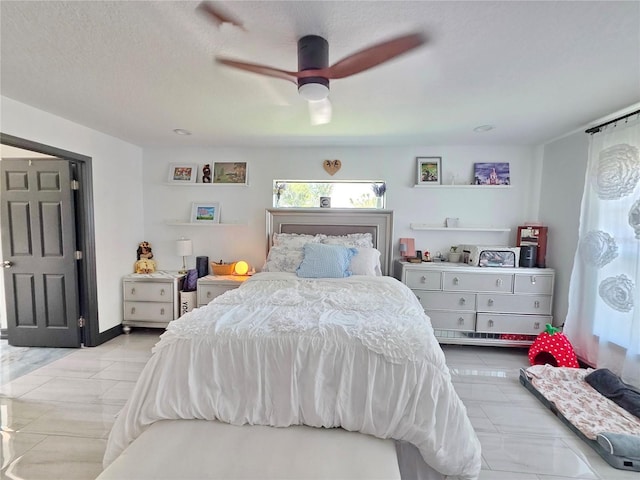 7935 NW 90th Ct, Okeechobee, FL 34972 - bedroom featuring ceiling fan and light marble finish floors