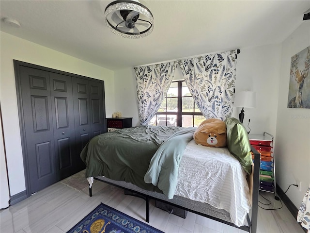 7935 NW 90th Ct, Okeechobee, FL 34972 - bedroom with a closet and baseboards