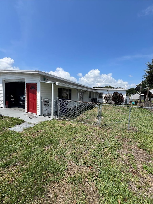 1096 8th St, Okeechobee, FL 34974 - view of property exterior featuring a gate