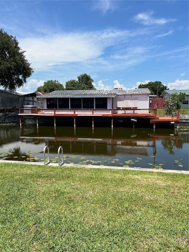 1096 8th St, Okeechobee, FL 34974 - dock area with a water view and a yard