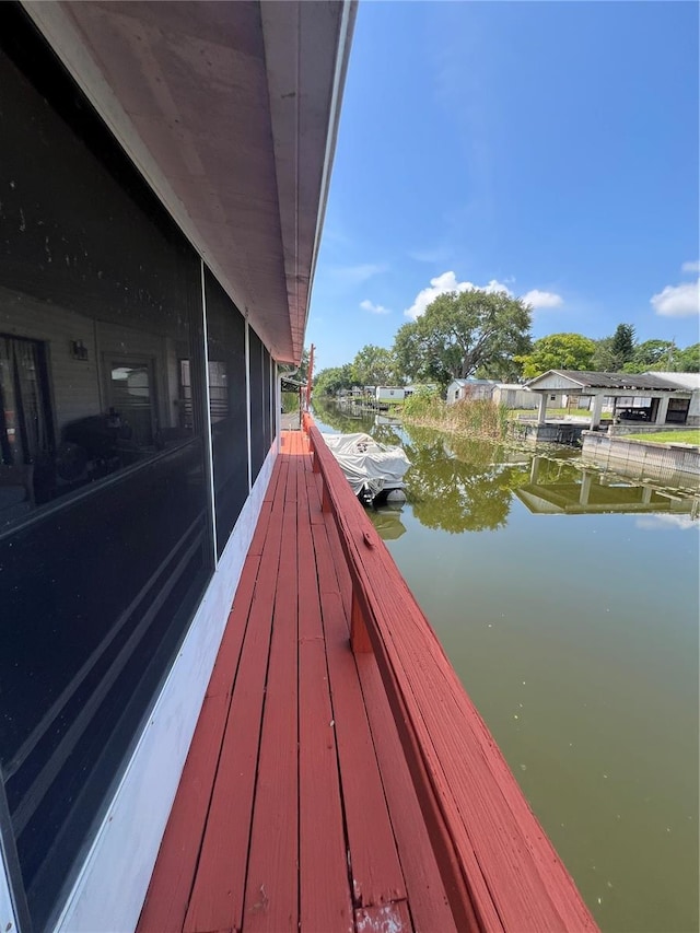 1096 8th St, Okeechobee, FL 34974 - deck with a water view and a boat dock