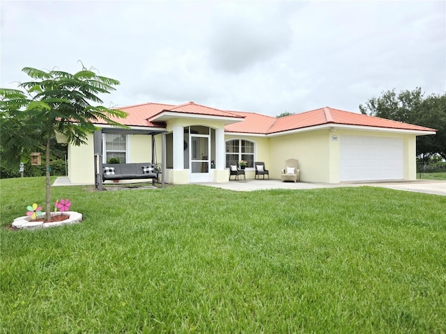 3897 NW 22nd Ave, Okeechobee, FL 34972 - rear view of property featuring stucco siding, a garage, a lawn, and metal roof