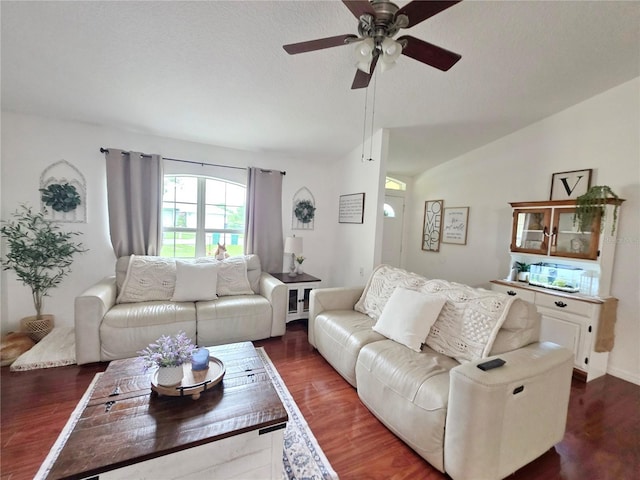 3897 NW 22nd Ave, Okeechobee, FL 34972 - living area featuring wood finished floors, ceiling fan, and vaulted ceiling