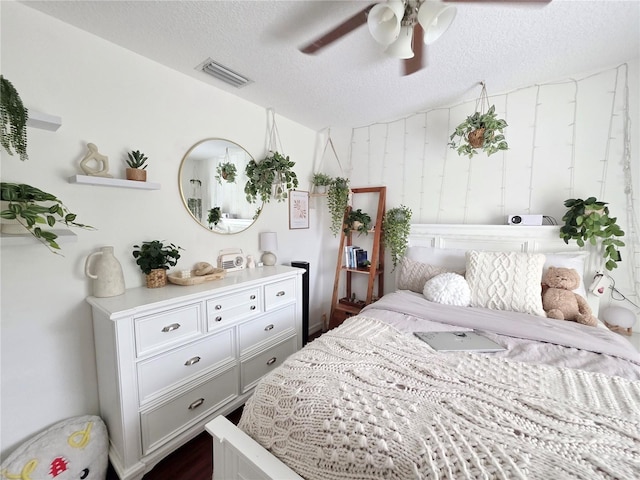 3897 NW 22nd Ave, Okeechobee, FL 34972 - bedroom featuring a textured ceiling, a ceiling fan, and lofted ceiling