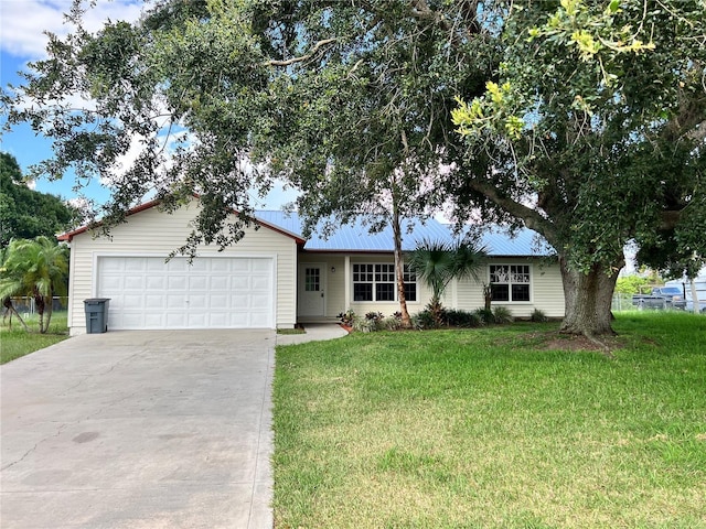 1150 SW 83rd Ave, Okeechobee, FL 34974 - single story home featuring driveway, a front lawn, and a garage