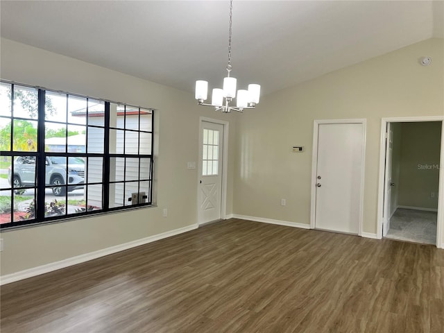 1150 SW 83rd Ave, Okeechobee, FL 34974 - unfurnished dining area with a chandelier, wood finished floors, healthy amount of natural light, and lofted ceiling