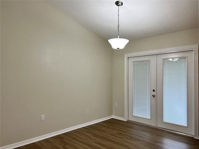 1150 SW 83rd Ave, Okeechobee, FL 34974 - unfurnished room with french doors and dark wood-style flooring