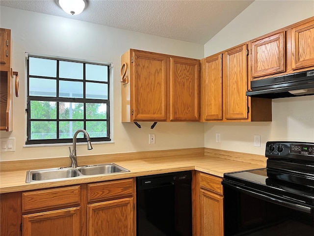 1150 SW 83rd Ave, Okeechobee, FL 34974 - kitchen featuring black appliances, under cabinet range hood, light countertops, a textured ceiling, and brown cabinetry