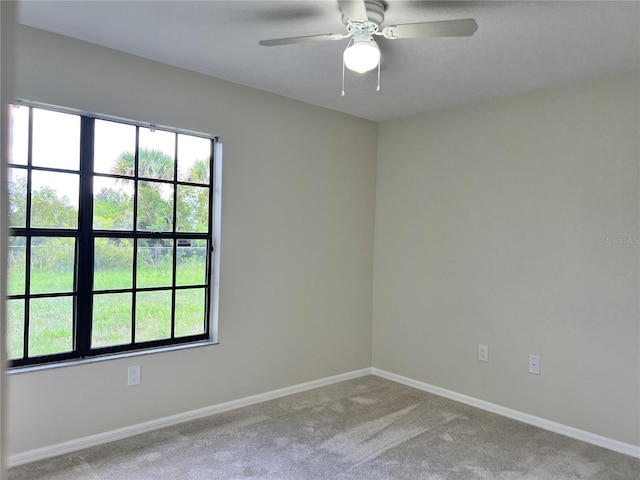 1150 SW 83rd Ave, Okeechobee, FL 34974 - spare room with carpet flooring and a ceiling fan