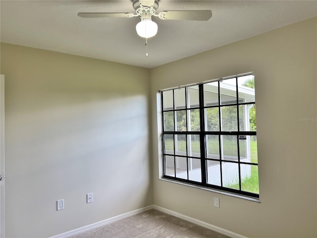 1150 SW 83rd Ave, Okeechobee, FL 34974 - carpeted spare room with plenty of natural light and ceiling fan