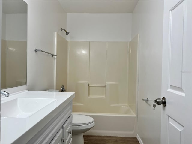 1150 SW 83rd Ave, Okeechobee, FL 34974 - bathroom featuring vanity, wood finished floors, and tub / shower combination
