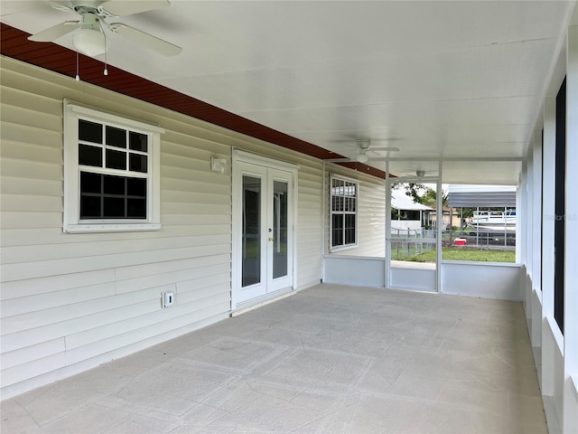 1150 SW 83rd Ave, Okeechobee, FL 34974 - unfurnished sunroom featuring a ceiling fan and french doors