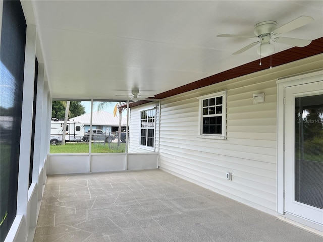 1150 SW 83rd Ave, Okeechobee, FL 34974 - unfurnished sunroom featuring ceiling fan