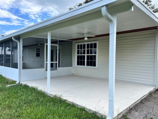 1150 SW 83rd Ave, Okeechobee, FL 34974 - view of patio / terrace with ceiling fan, a sunroom, and a carport