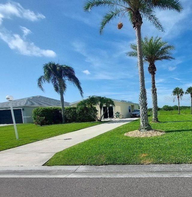 1000 SW 44th Blvd, Okeechobee, FL 34974 - view of front of house featuring a front lawn