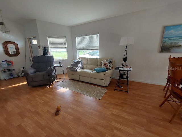 1000 SW 44th Blvd, Okeechobee, FL 34974 - living room featuring light wood-style flooring and baseboards