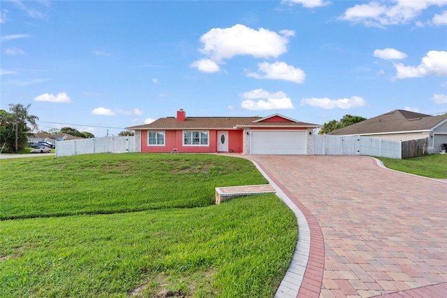 402 SW Seaflower Ter, Port St Lucie, FL 34984 - ranch-style home featuring an attached garage, decorative driveway, and a chimney