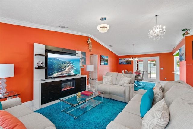 402 SW Seaflower Ter, Port St Lucie, FL 34984 - living room with a chandelier, crown molding, and lofted ceiling