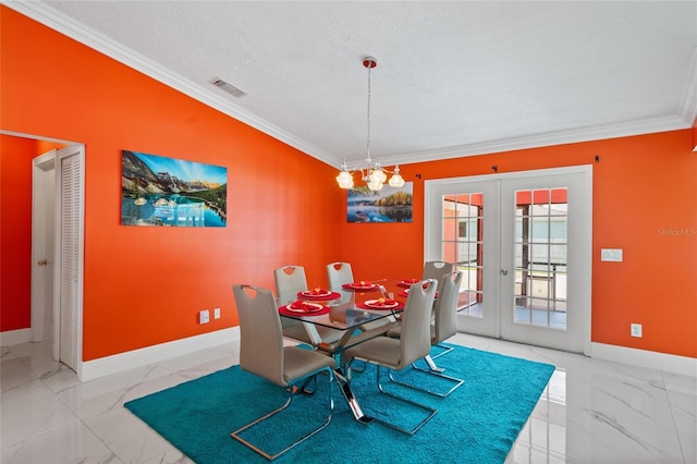 402 SW Seaflower Ter, Port St Lucie, FL 34984 - dining area with french doors, marble finish floors, crown molding, a chandelier, and a textured ceiling