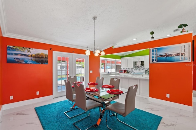 402 SW Seaflower Ter, Port St Lucie, FL 34984 - dining room featuring light marble finish floors, crown molding, a textured ceiling, french doors, and a chandelier