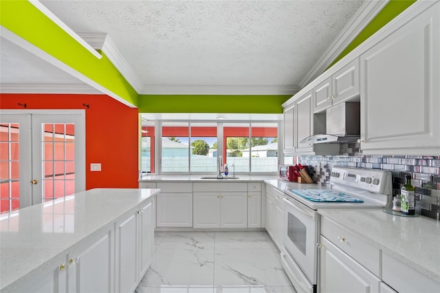 402 SW Seaflower Ter, Port St Lucie, FL 34984 - kitchen with white electric range oven, under cabinet range hood, white cabinets, backsplash, and french doors