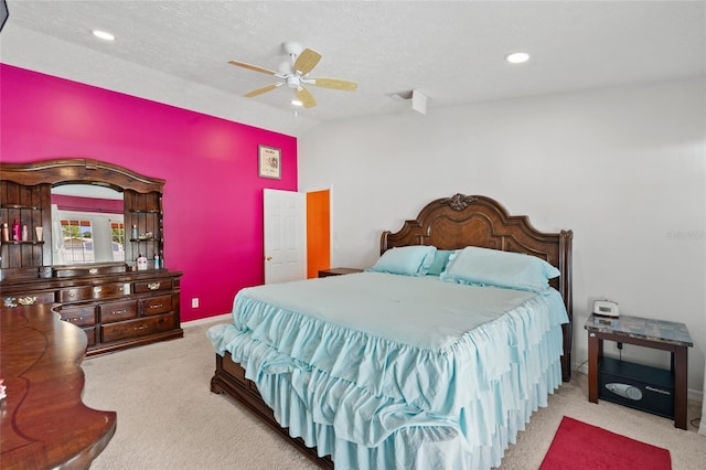 402 SW Seaflower Ter, Port St Lucie, FL 34984 - bedroom featuring carpet, lofted ceiling, ceiling fan, a textured ceiling, and recessed lighting