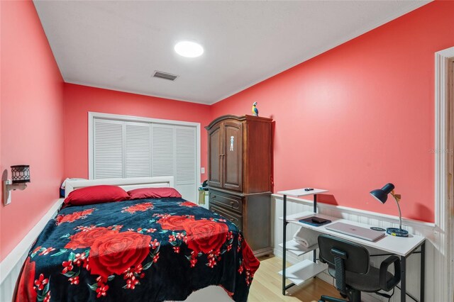402 SW Seaflower Ter, Port St Lucie, FL 34984 - bedroom with light wood finished floors and ornamental molding