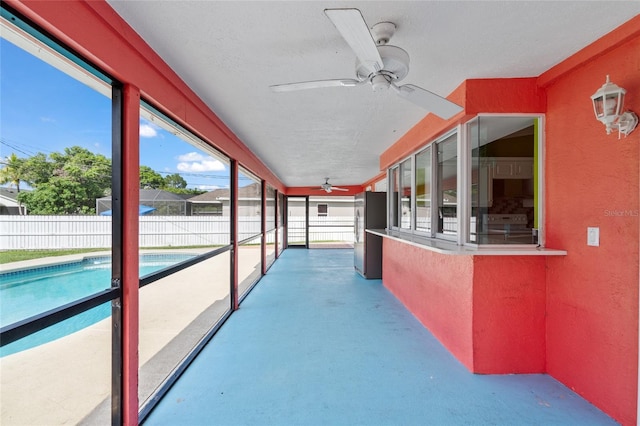 402 SW Seaflower Ter, Port St Lucie, FL 34984 - unfurnished sunroom featuring ceiling fan