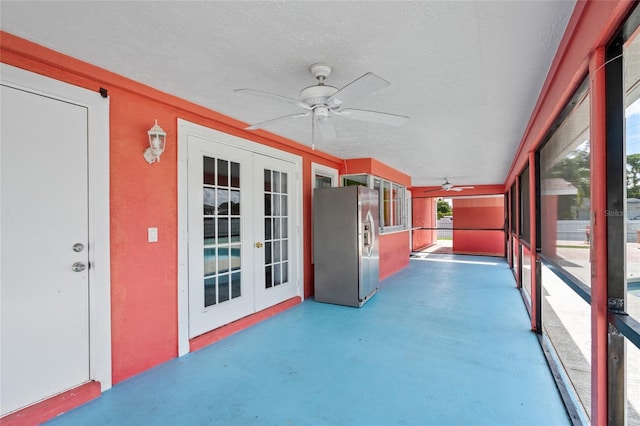 402 SW Seaflower Ter, Port St Lucie, FL 34984 - unfurnished sunroom with french doors and a ceiling fan