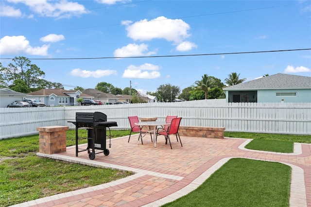 402 SW Seaflower Ter, Port St Lucie, FL 34984 - fenced backyard with area for grilling and a patio area