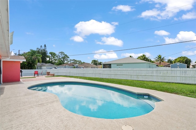 402 SW Seaflower Ter, Port St Lucie, FL 34984 - view of pool featuring a fenced backyard and a patio area