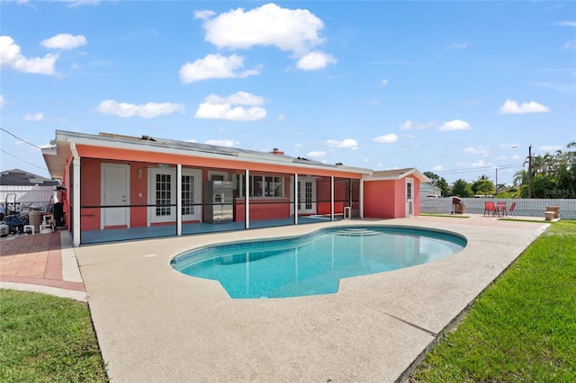 402 SW Seaflower Ter, Port St Lucie, FL 34984 - view of pool with french doors and a patio area