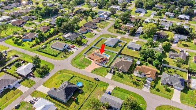 402 SW Seaflower Ter, Port St Lucie, FL 34984 - aerial view of property and surrounding area featuring nearby suburban area