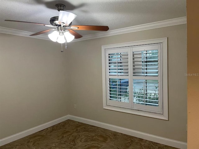 tiled empty room with ceiling fan, a textured ceiling, and crown molding