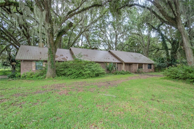 exterior space with a lawn